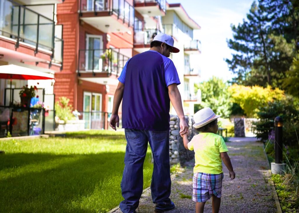 father and son walking