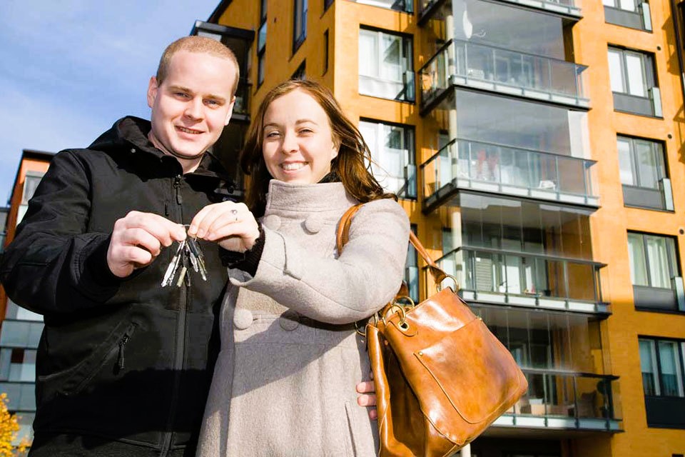 Young couple with house keys